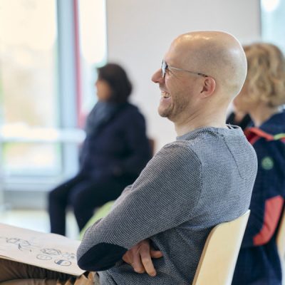 lachender Teilnehmer